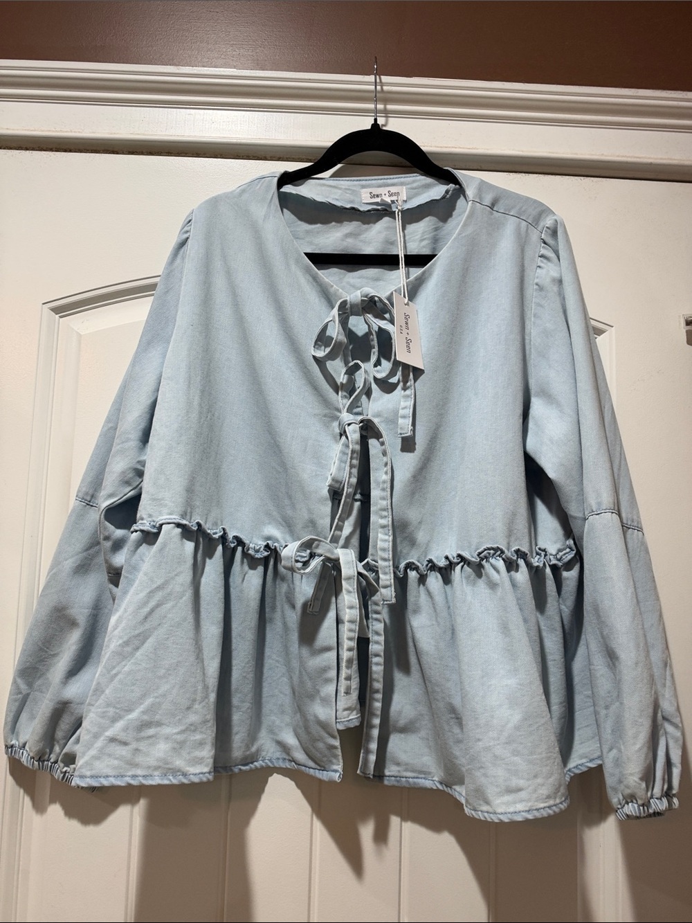 Soft Light Blue Tie-Front Peplum Jean Jacket by
